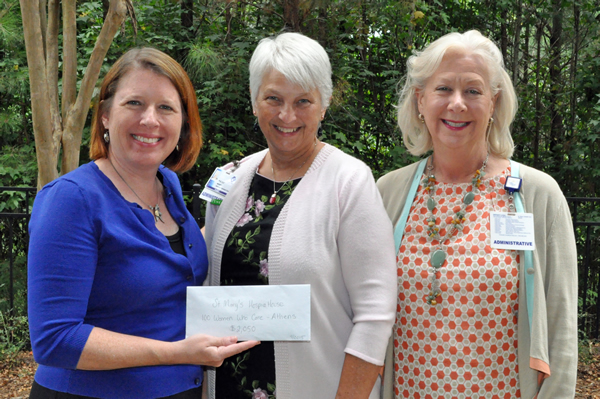 Delivering $2,050 to support St. Mary's Hospice House