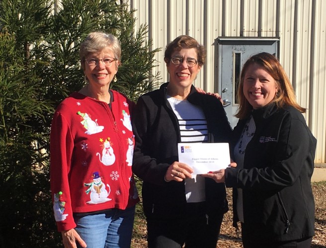 Check presentation in front of Bigger Vision of Athens